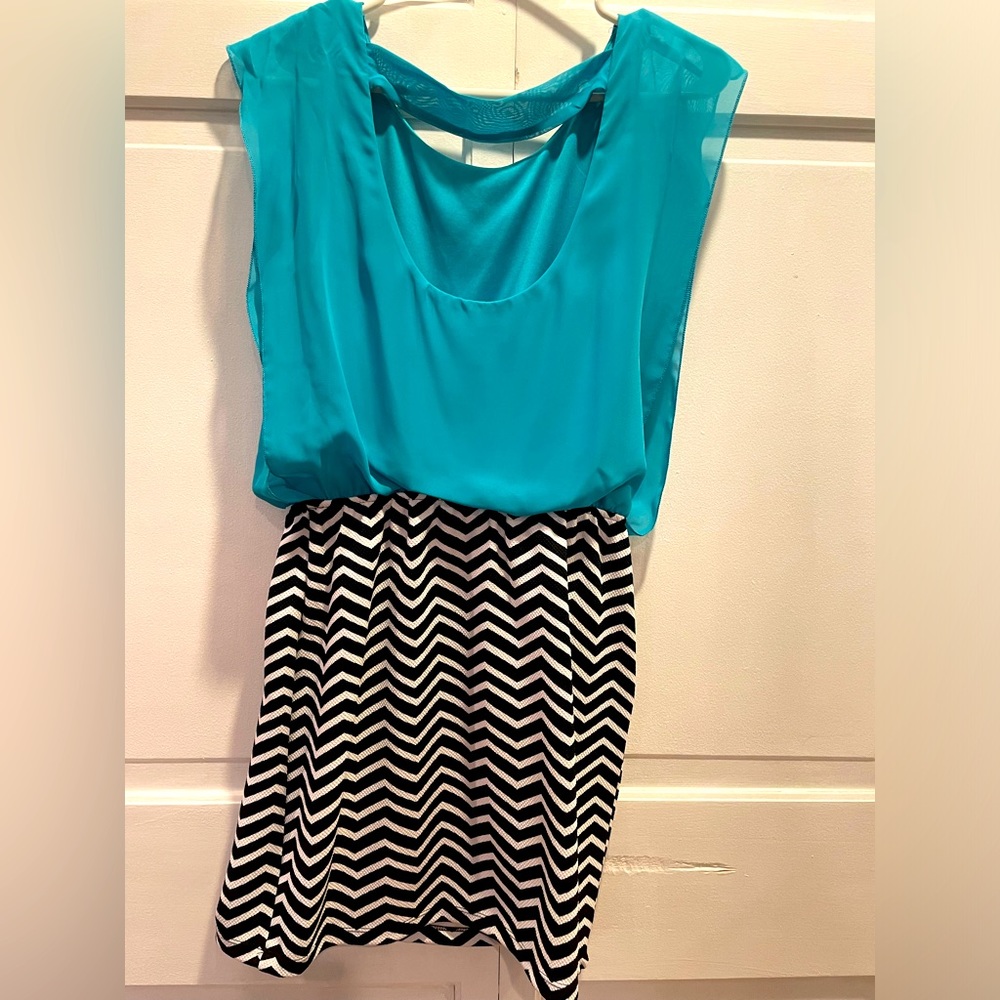 Speechless, light blue chiffon top, black and white fitting mini skirt dress.